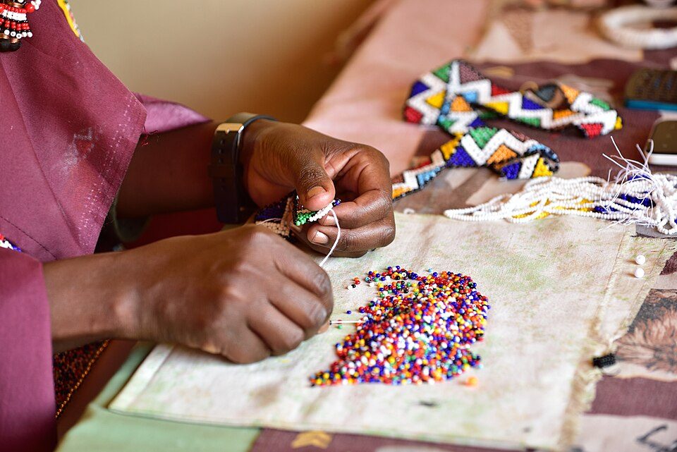 Intricate beadwork in progress — the level of craft skill the wider market hasn't yet seen