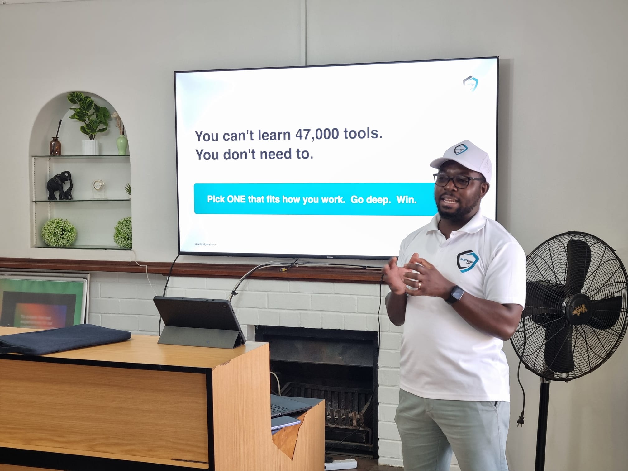 Skaitbridge Lab facilitator teaching a corporate AI training workshop to a marketing team in Harare, Zimbabwe